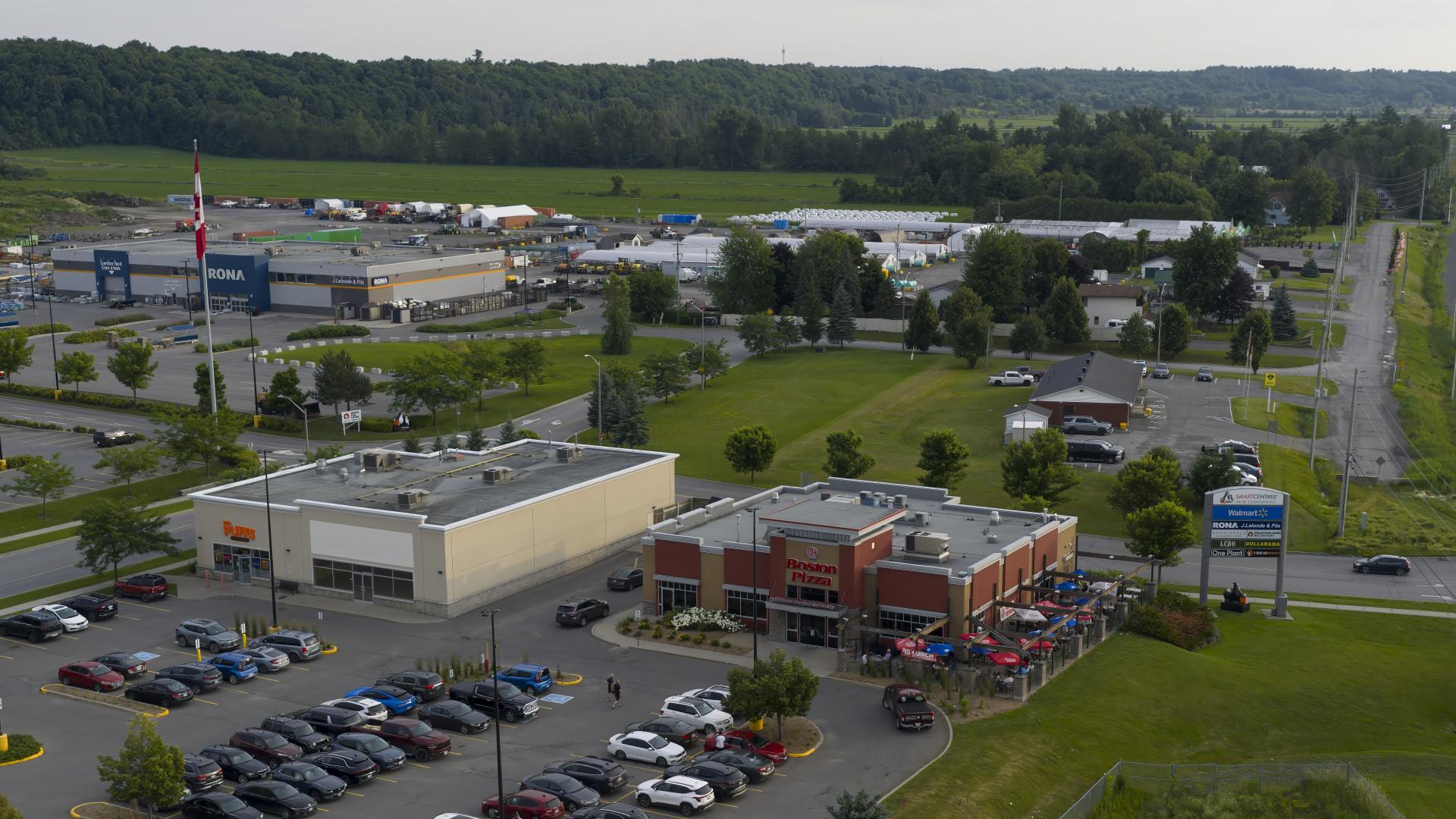 drone view of businesses along County Road 17 with the Ottawa River on the right