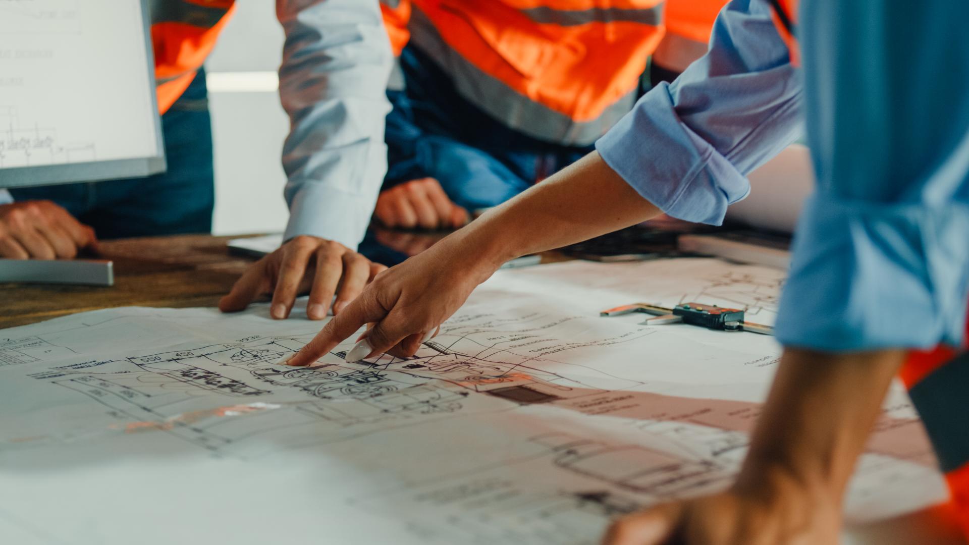 team looking at plans