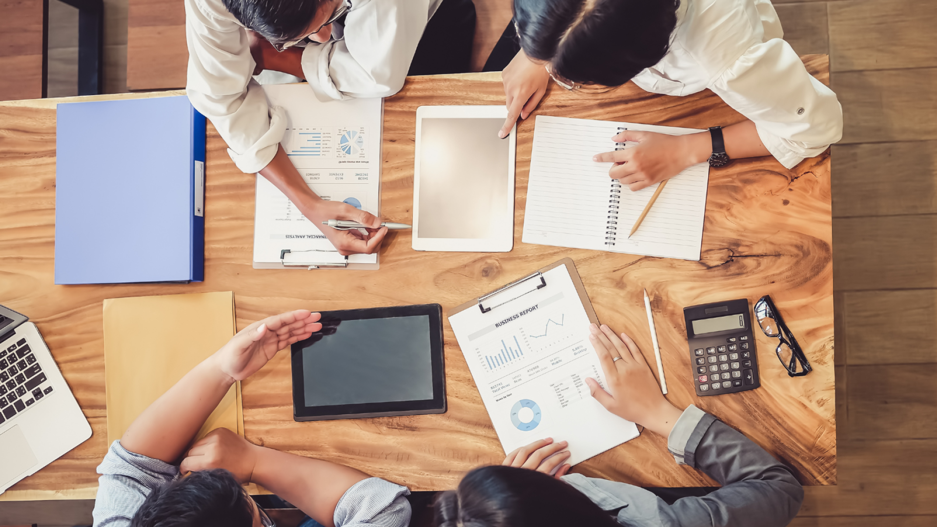 colleagues working at desk together
