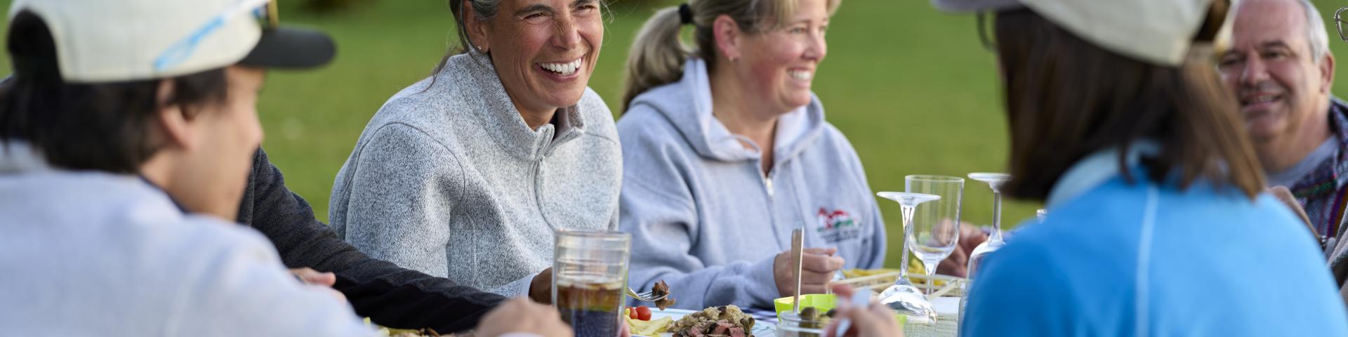 Residents enjoying picnic in park