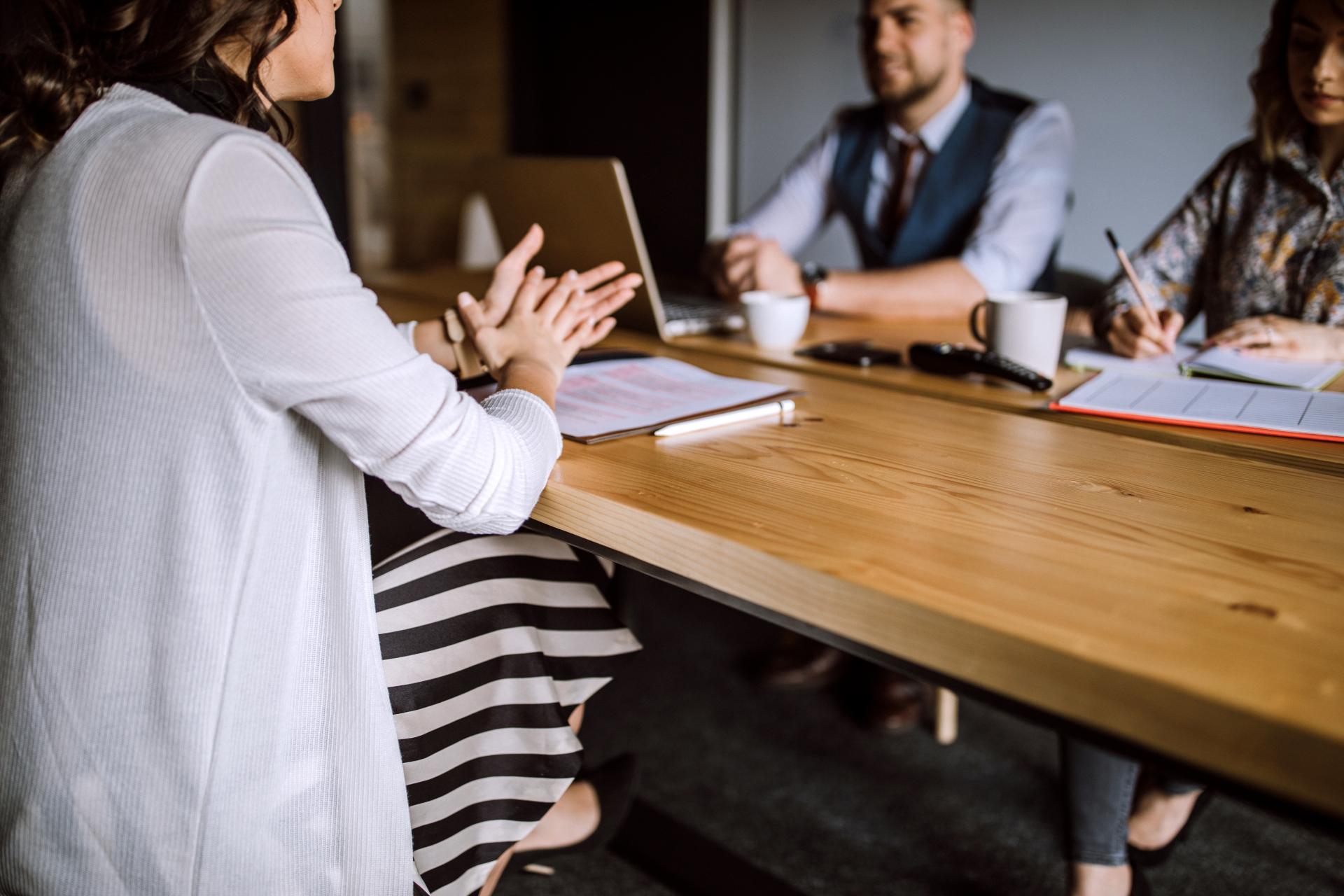 Business meeting with three people